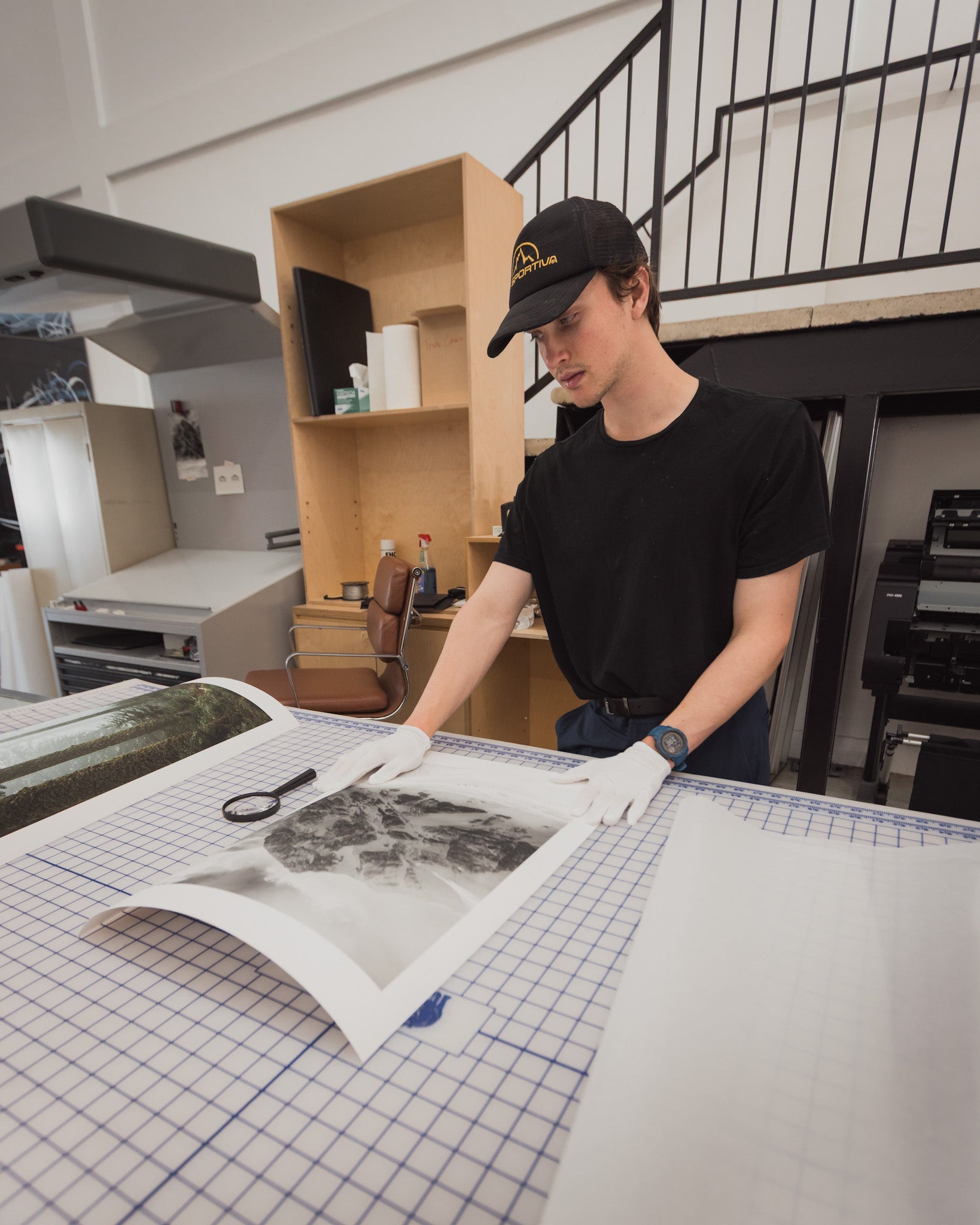 Ronnie Forslund reviewing and testing artworks before they are packaged